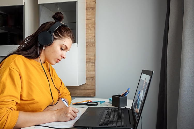 A person at a computer.